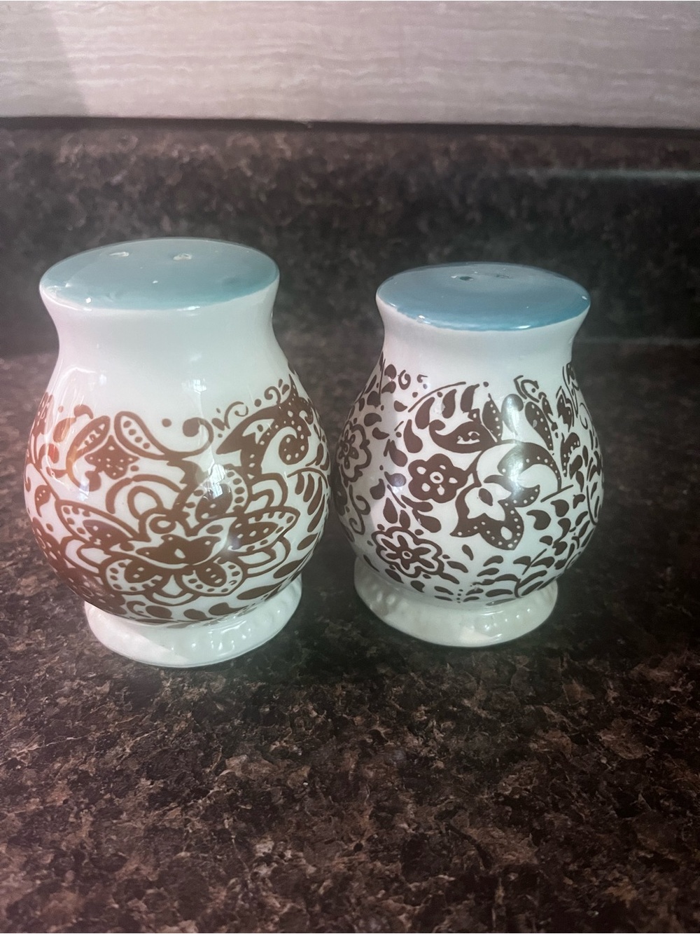 Decorative White Ceramic Salt and Pepper Shakers with Blue Tops